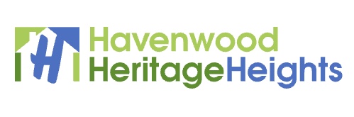 A green and white logo for the ravenwood heritage home.